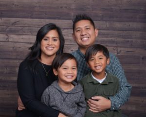 Bryan Calungcagin, M.S. ’20 pictured with his wife Adeleen ’02 and their two sons. Calungcagin says his family is his source of strength and motivation.
