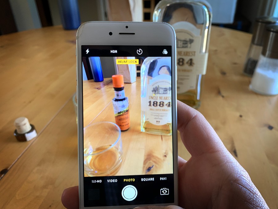 Smartphone camera capturing cocktail ingredients.