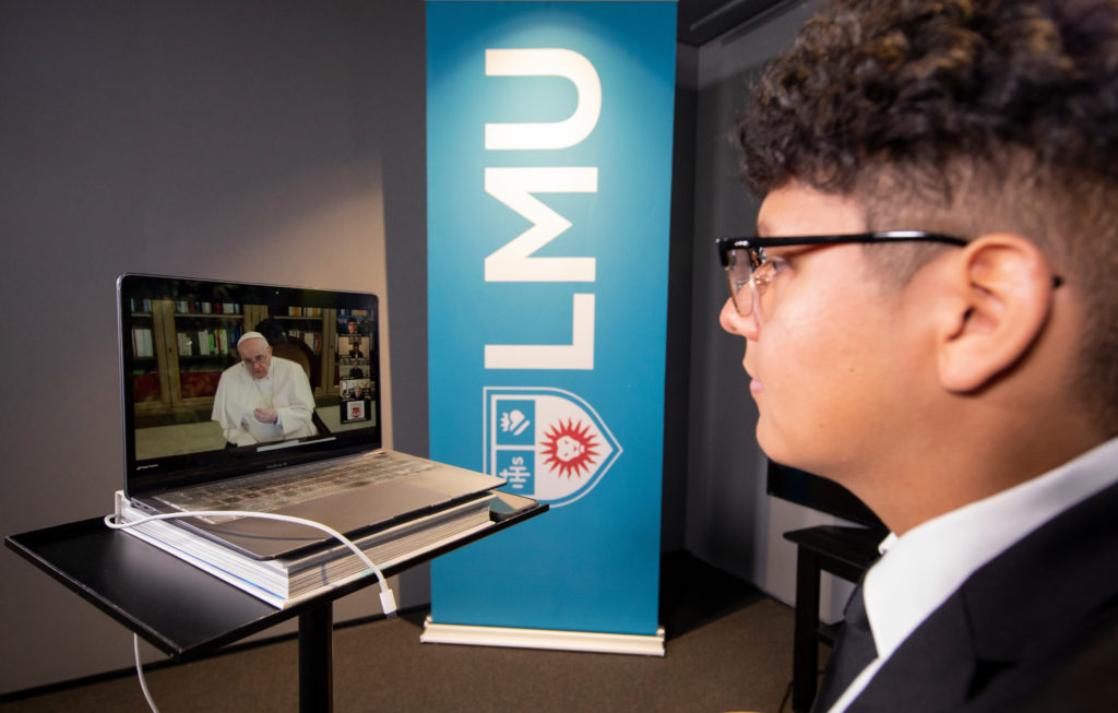 Image of LMU student speaking with Pope Francis on Zoom