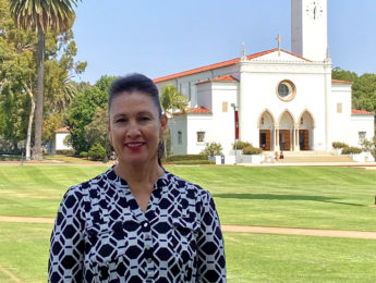 Adela del Río outside Sacred Heart Chapel on the LMU campus