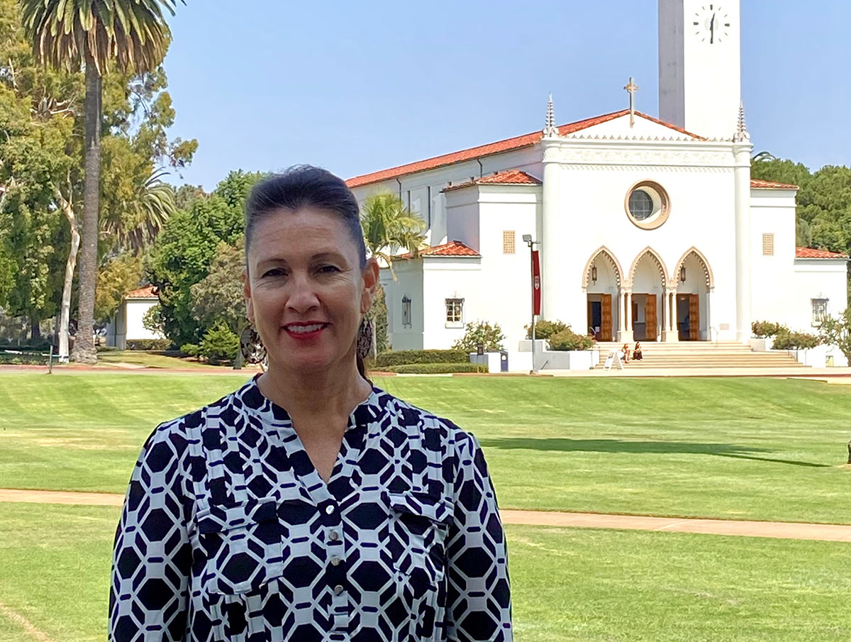 Adela del Río outside Sacred Heart Chapel on the LMU campus