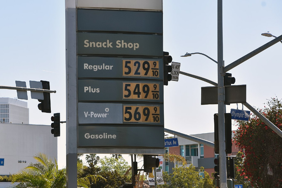 gas prices on sign at gas station