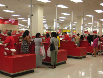 Shoppers at cash registers in a Target store