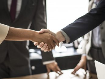 handshake between business people
