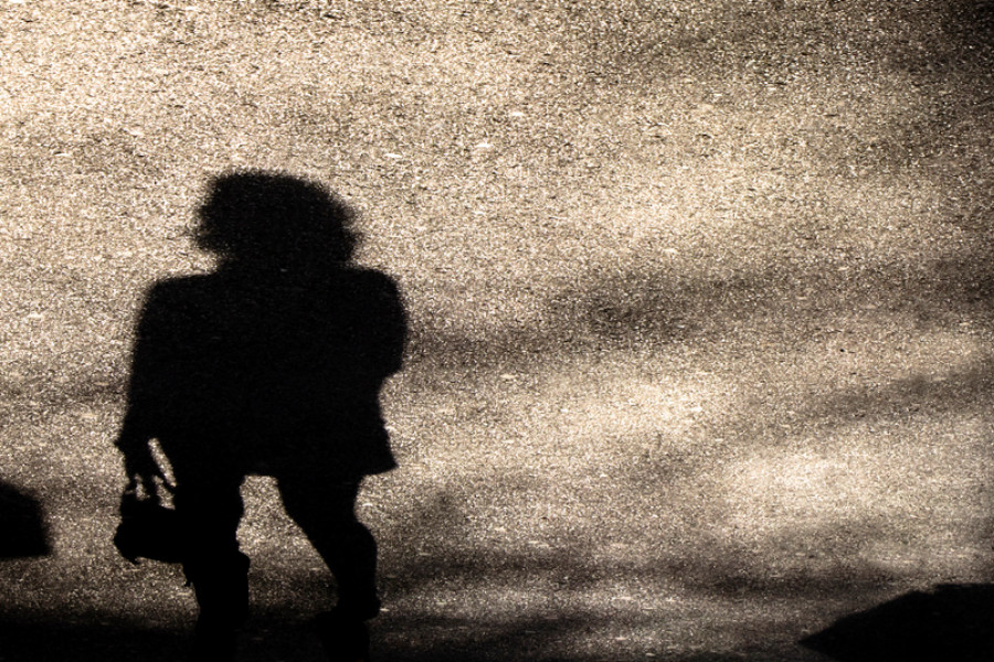 shadow of woman walking