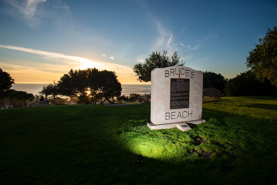 A plaque stands at Bruce's Beach, the former Black-owned seaside resort in Manhattan Beach owned by Charles and Willa Bruce.