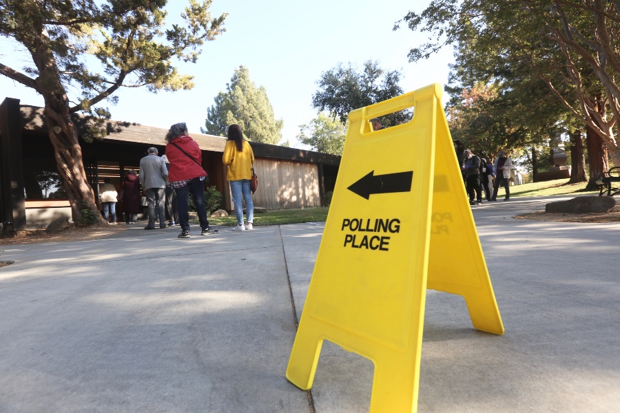 Sign pointing to voter polling place