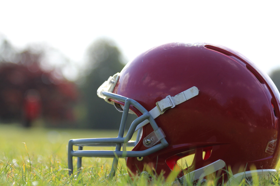 Football helmet on a field