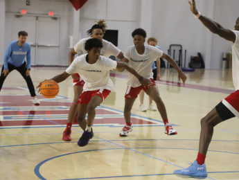 Image of men's basketball players practicing