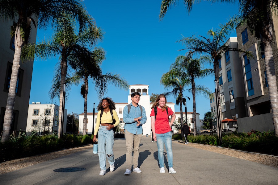 LMU students walking near residence halls