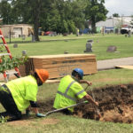 Investigators dig in Tulsa's Oaklawn Cemetery on July 15, 2020, as part of the search for victims of the 1921 Tulsa Race Massacre.