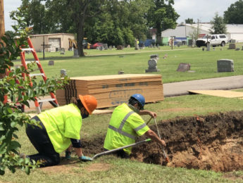 Investigators dig in Tulsa's Oaklawn Cemetery on July 15, 2020, as part of the search for victims of the 1921 Tulsa Race Massacre.