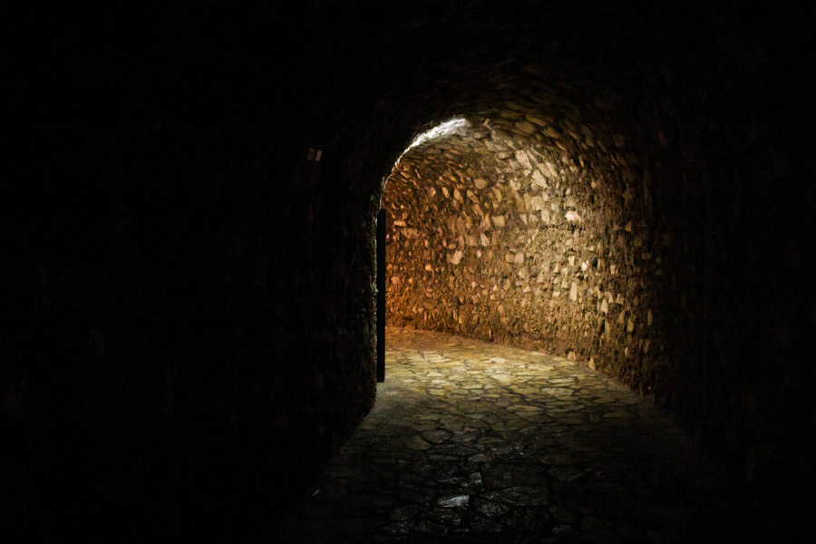 dark tunnel with light at the end