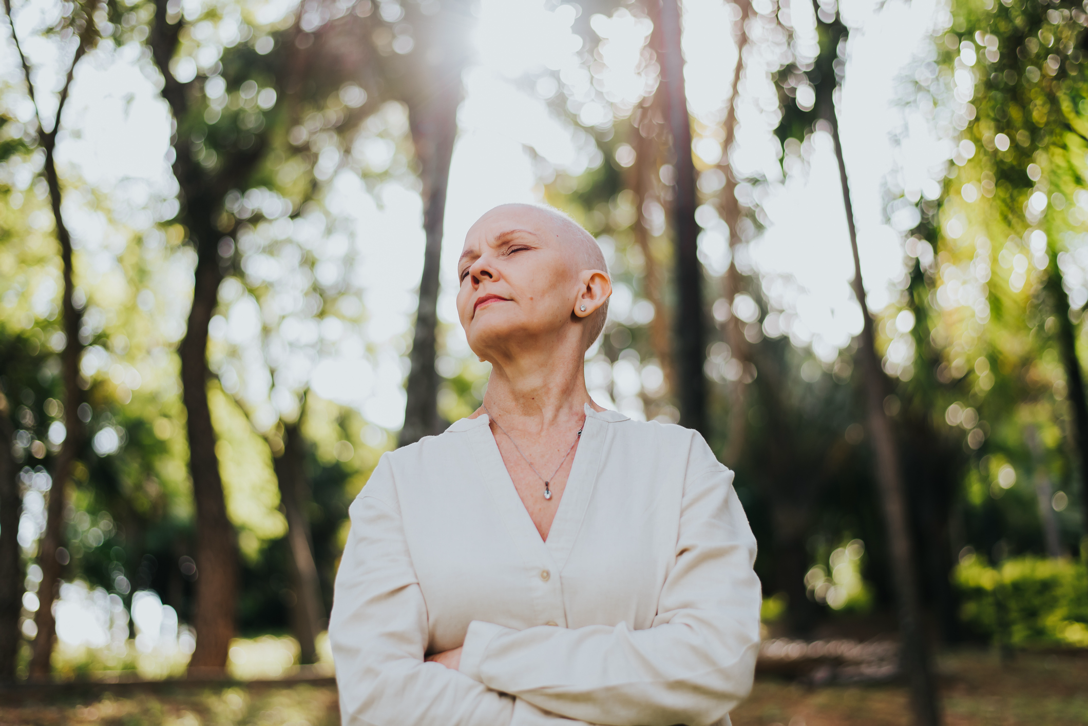 Woman with lung cancer at peace in nature