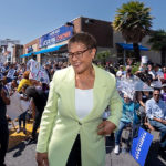 Karen Bass with supporters in background