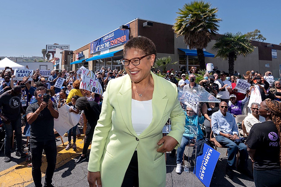 Karen Bass with supporters in background