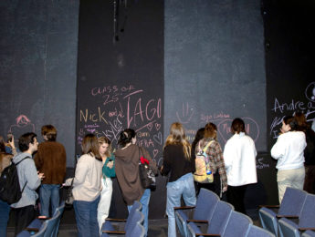 Participants were invited to write reflections and remembrances on the walls of the theatre