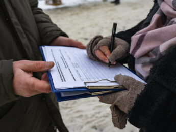 activist collecting signatures for a petition