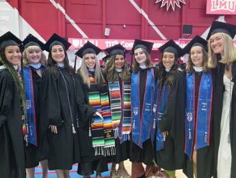Group of graduating students in caps and gown