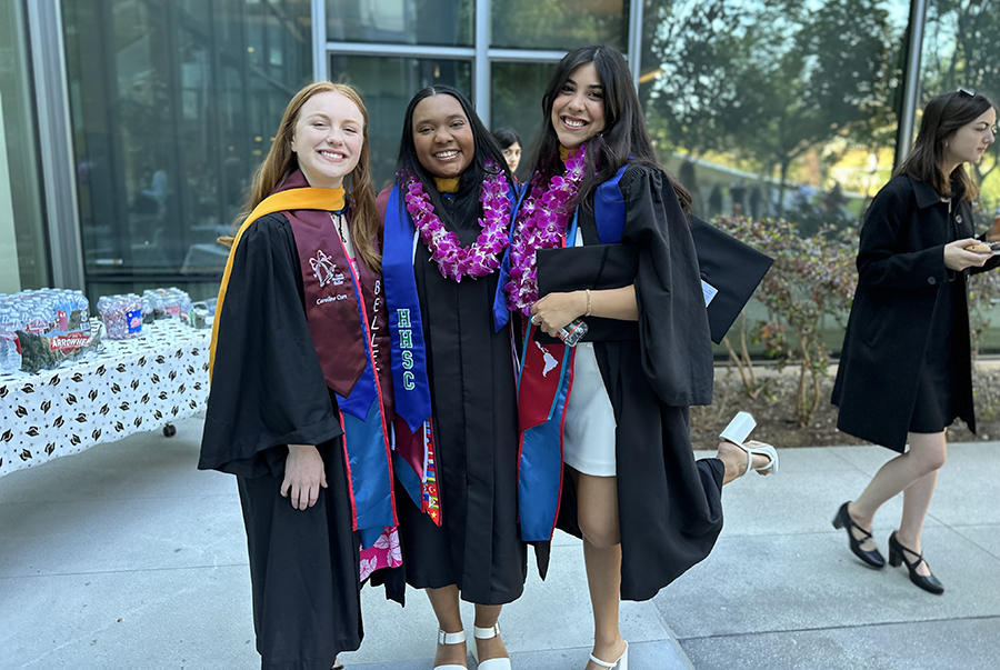 Three HHSC graduates pose for a photo