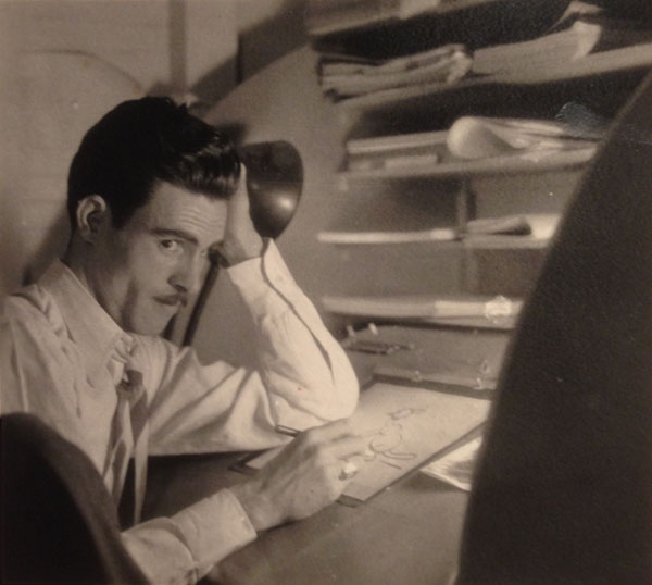 Cartoonist Manuel Moreno at his desk in the 1930s.