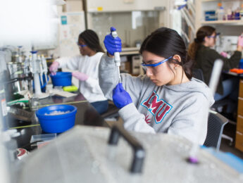 LMU students conduct biochemistry research under Professor Mouzakis.