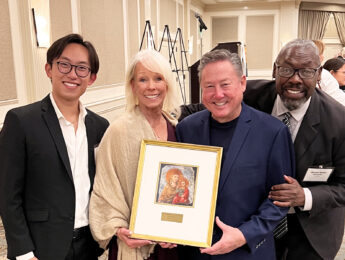 Pictured left to right: Jeremy Lee, assistant director of choral activities, John's wife Kathleen, John Flaherty, and Bryant Keith Alexander, CFA dean